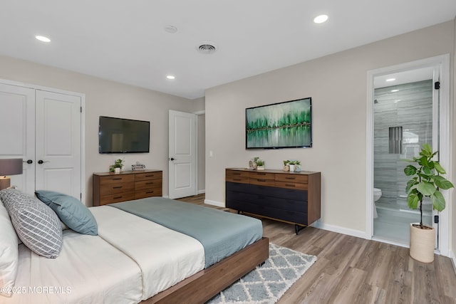 bedroom with baseboards, recessed lighting, visible vents, and light wood-style floors