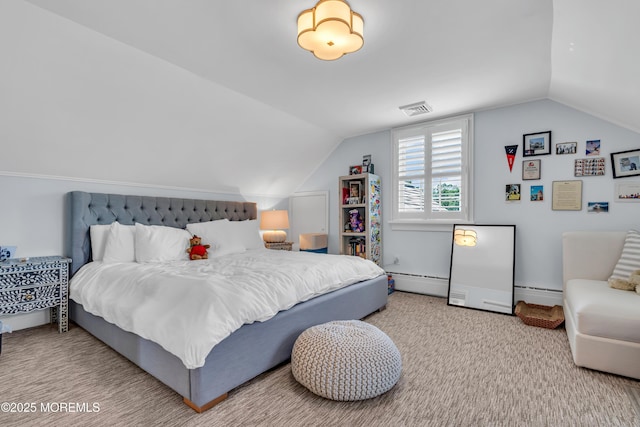 bedroom featuring a baseboard heating unit, carpet flooring, lofted ceiling, and visible vents