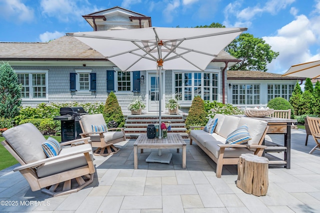 view of patio / terrace featuring a grill and an outdoor living space