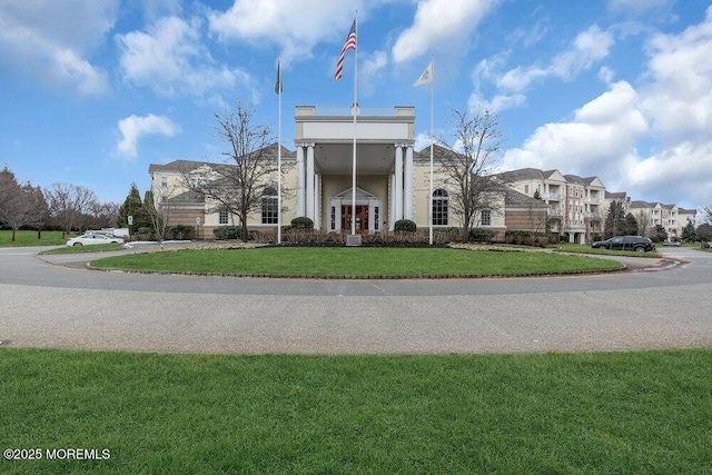 view of property with a residential view