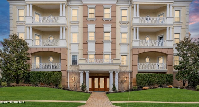 view of property at dusk