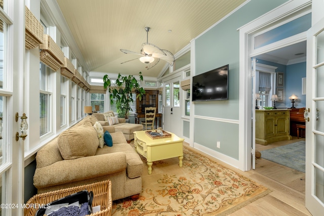 interior space featuring ceiling fan and vaulted ceiling