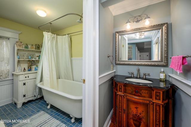 full bath with tile patterned floors, shower / tub combo with curtain, crown molding, and vanity