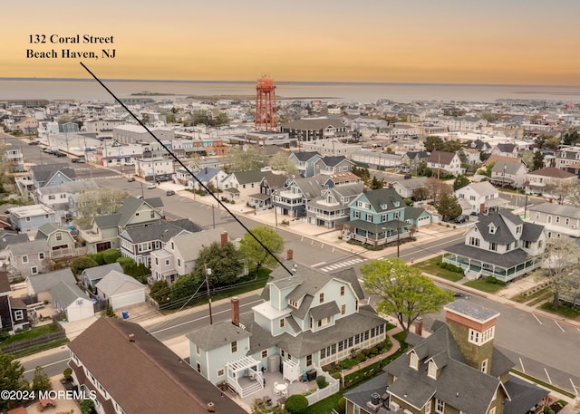 aerial view at dusk with a residential view