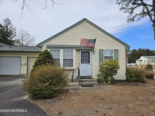 bungalow-style home featuring driveway