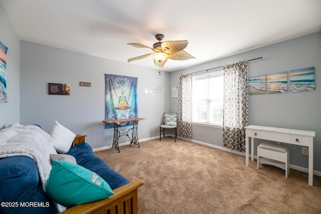 living area featuring a ceiling fan, carpet, and baseboards