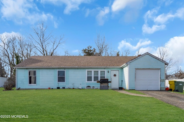 ranch-style house with an attached garage, driveway, a front lawn, and roof with shingles