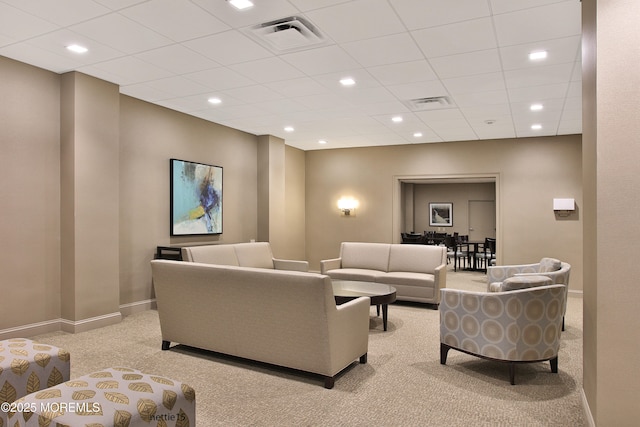 interior space with recessed lighting, visible vents, light carpet, and baseboards