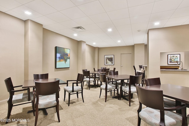 dining area featuring recessed lighting, visible vents, baseboards, and light colored carpet