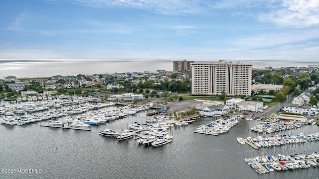 drone / aerial view with a water view and a view of city