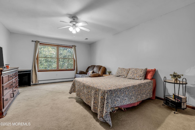 bedroom with light carpet, ceiling fan, baseboards, and baseboard heating