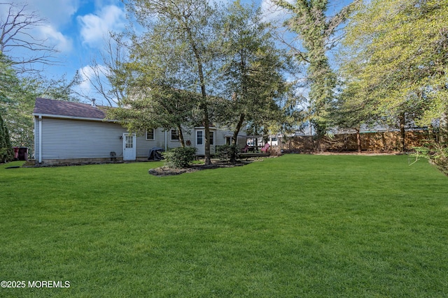 view of yard with fence