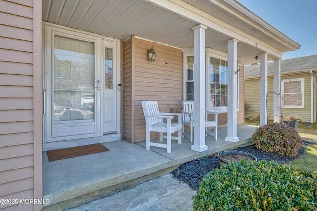 doorway to property with covered porch