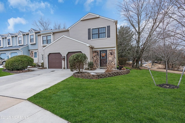 view of front of property with a front yard, stone siding, an attached garage, and concrete driveway