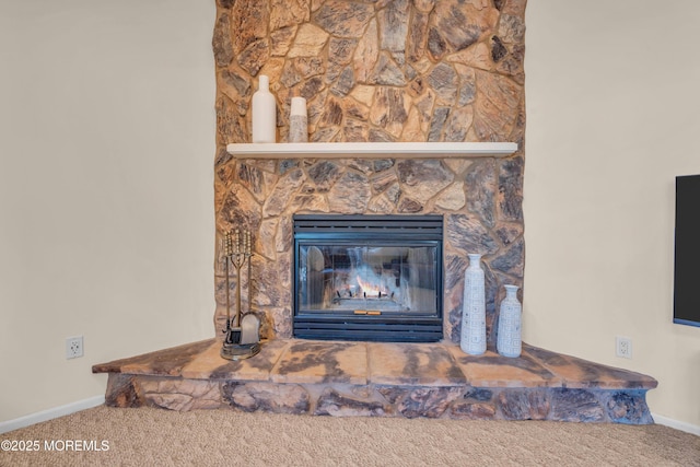 details with carpet flooring, a fireplace, and baseboards