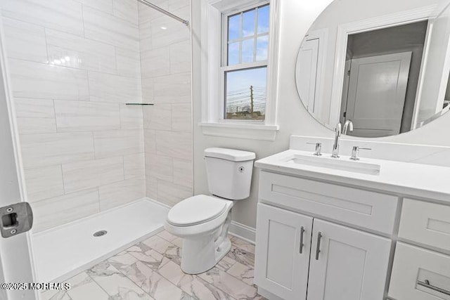 full bathroom with baseboards, toilet, marble finish floor, vanity, and a shower stall