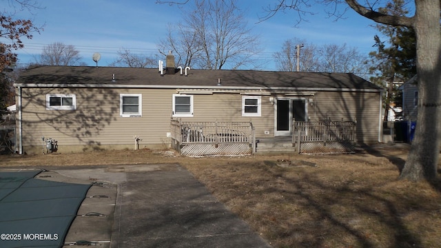 back of house with a patio area