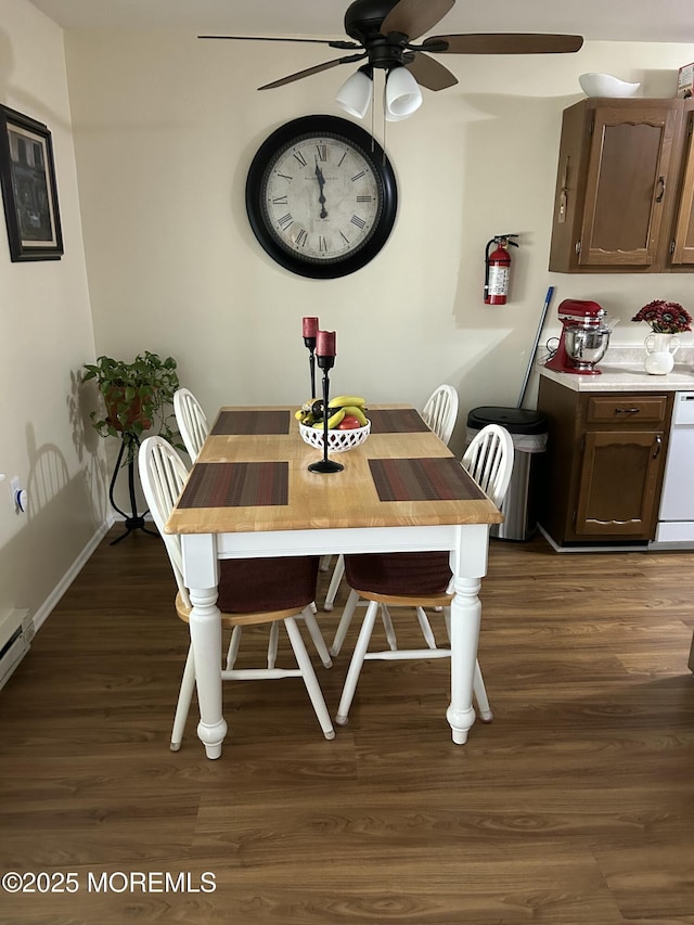 882 Balmoral Ct Unit D, Lakewood, NJ 08701 - dining area featuring ceiling fan, dark wood-type flooring, and baseboards