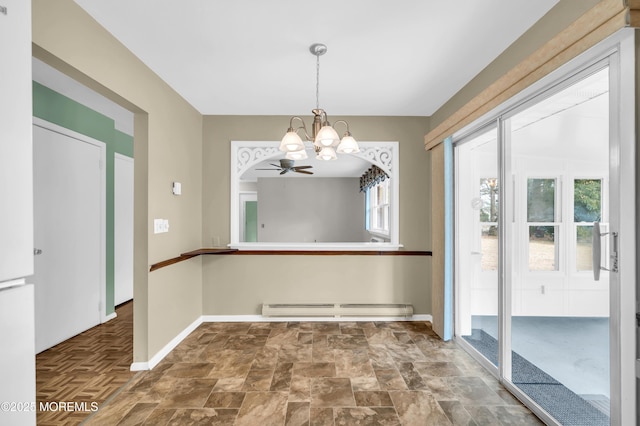 unfurnished dining area with a baseboard radiator, baseboards, and an inviting chandelier