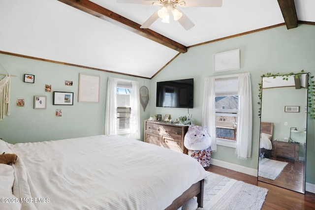 bedroom with lofted ceiling with beams, a ceiling fan, baseboards, and dark wood-type flooring