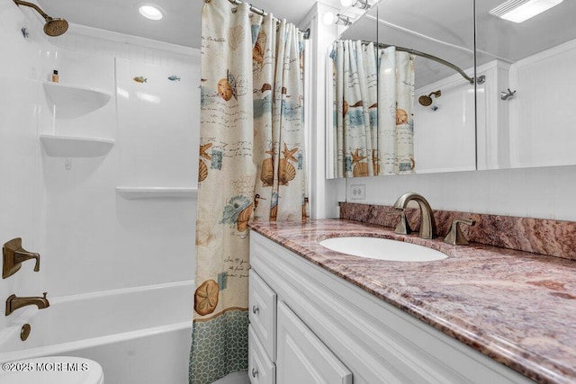 full bath featuring shower / bathtub combination with curtain and vanity