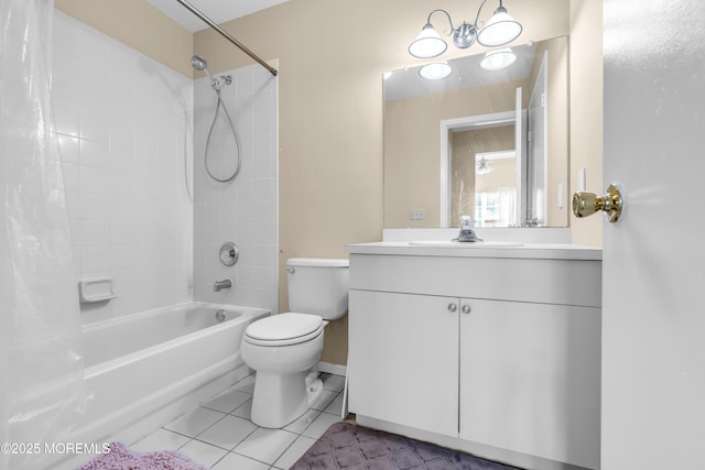 full bath with tile patterned flooring, toilet, vanity, and shower / bath combo with shower curtain