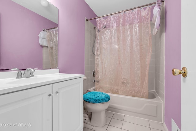 full bath featuring tile patterned floors, toilet, vanity, and shower / bath combination with curtain