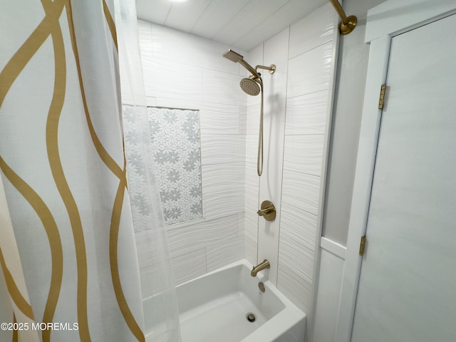 bathroom featuring shower / bath combo with shower curtain