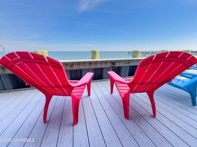 deck featuring a water view