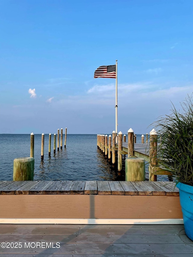 view of dock with a water view