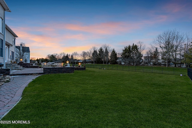 view of yard with a fenced backyard and a patio