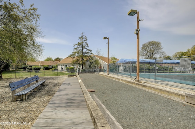 view of dock featuring fence