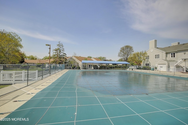 community pool with fence