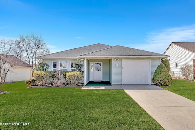 view of front of home with a garage, concrete driveway, a front lawn, and a shingled roof