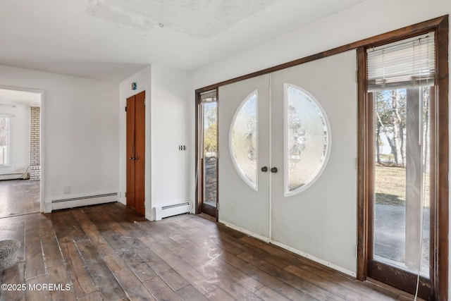 entryway featuring plenty of natural light, a baseboard heating unit, and dark wood-style flooring