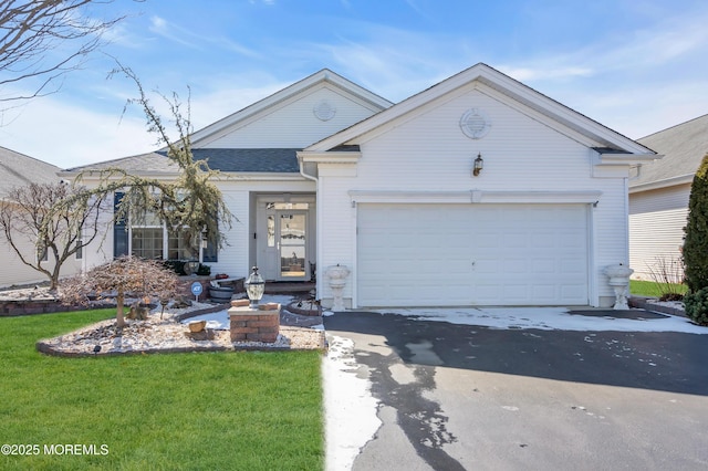 single story home featuring a garage, driveway, a shingled roof, and a front lawn