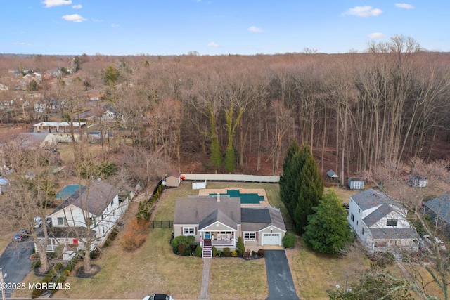 bird's eye view featuring a forest view