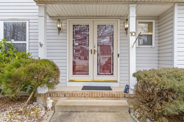 entrance to property with french doors and covered porch