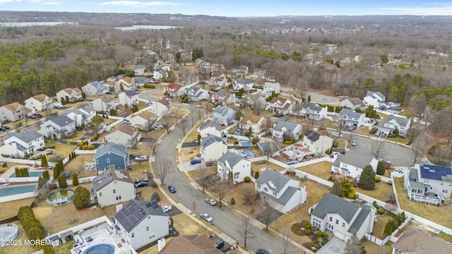 birds eye view of property with a residential view