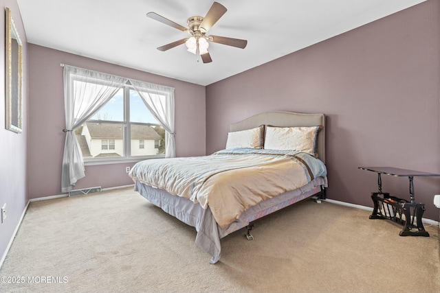 bedroom featuring a ceiling fan, carpet, visible vents, and baseboards