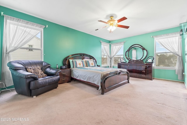 bedroom featuring carpet flooring and a ceiling fan