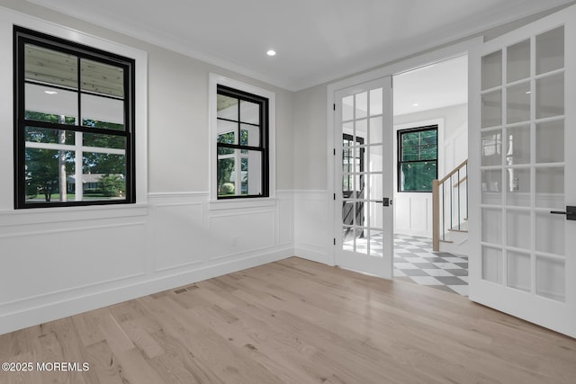 121 Black Point Rd, Rumson, NJ 07760 - spare room featuring french doors, wood finished floors, wainscoting, a decorative wall, and recessed lighting