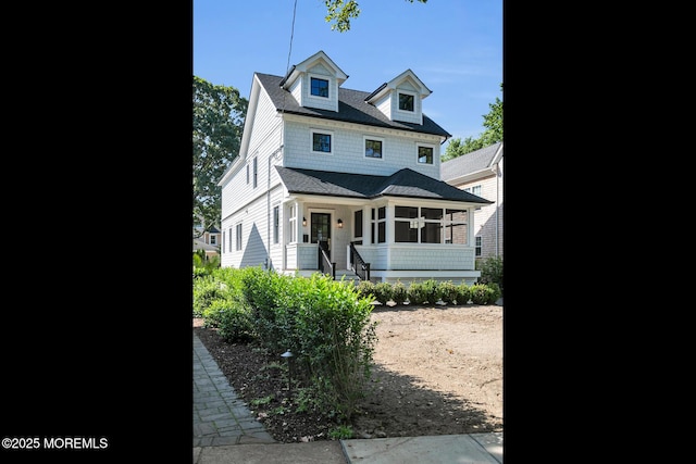121 Black Point Rd, Rumson, NJ 07760 - view of front facade featuring a sunroom and a shingled roof