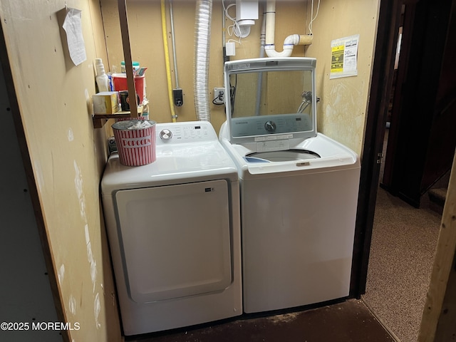 laundry room with washing machine and dryer