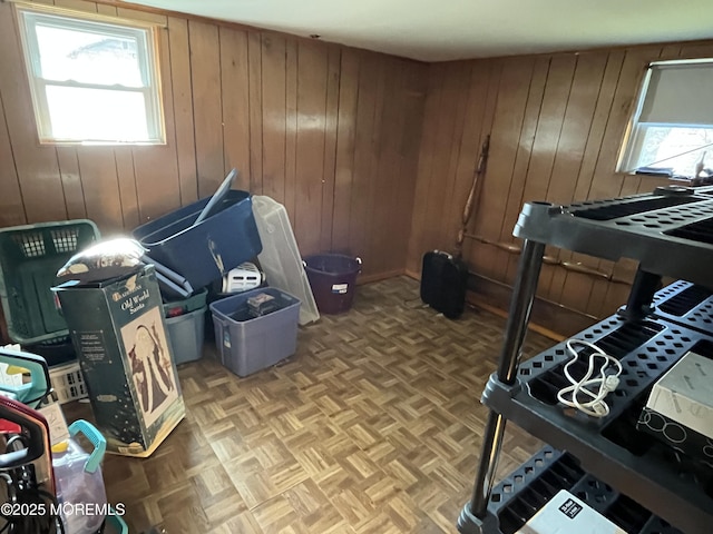 bedroom with wood walls