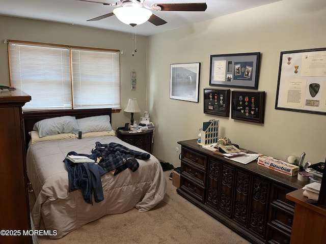 bedroom featuring carpet and ceiling fan