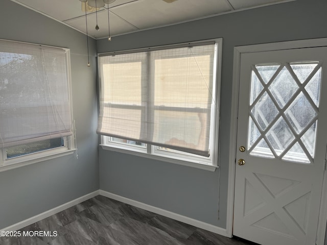 entryway featuring baseboards