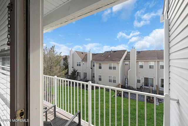 balcony featuring a residential view