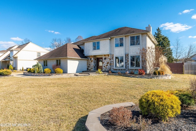 view of front of home with stone siding, a chimney, fence, a front yard, and stucco siding