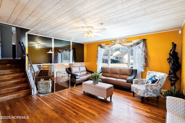 living room featuring a ceiling fan, wood ceiling, stairs, and wood finished floors